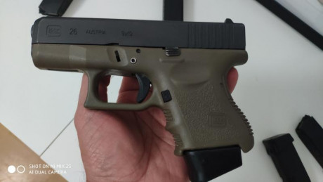 Vendo Glock 26 color verde militar muy poco uso entrego con maletín llave para cambiar miras y 5 cargadores...3 00
