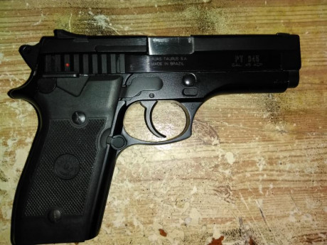 Hola compañeros de tiro, pongo en venta mi taurus pt 945 en calibre 45 acp con un solo cargador de 8+1, 01