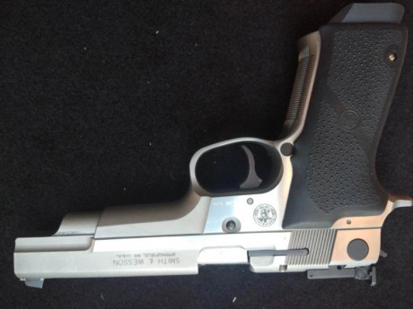  IMG_20200211_180139.jpg Se vende S&W Target Champion de 5" en 9mm, con dos cargadores, se puede 80