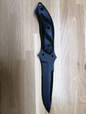 Diseñado por el renombrado fabricante de cuchillos personalizado Allen Elishewitz, el Nightedge es un 00