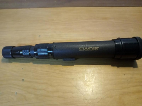 Telescopio Simmons modelo 1200 de 15-45x50, con algunos rasguños en el exterior pero óptica en muy buen 01