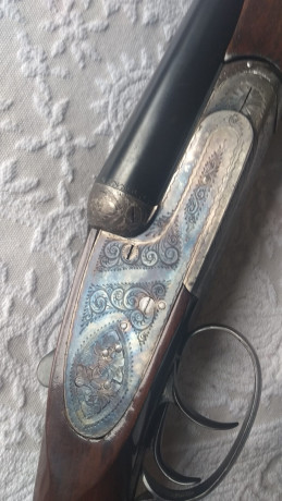 un amigo vende una escopeta paralela victor saraqueta calibre 12.saludos. 01