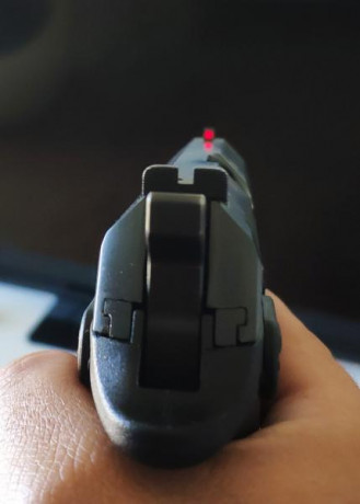 Vendo pistola grand power con cañón de 5 pulgadas, 4 cargadores y funda ipsc, tiene un año y unos 500 01