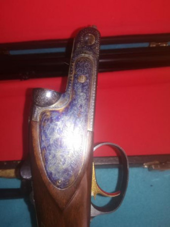 Escopeta paralela, pletinas jaspe enteras, bonitos grabados, choques en ambos cañones, disparador único 12