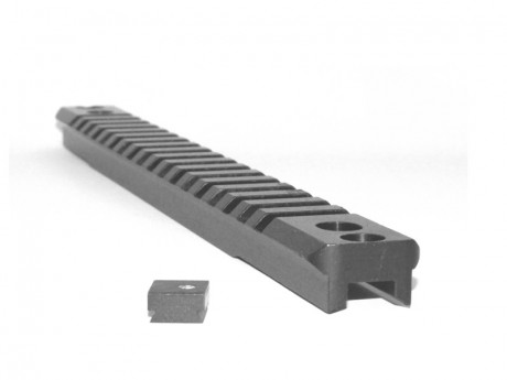 Rail picatinny para   SAIGA 12   y creo que para   410   tambien
se monta encima del tubo de gas 
se puede 10