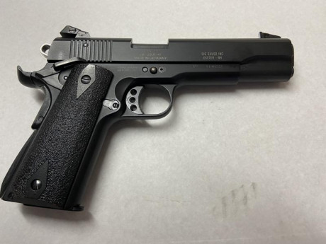  vendo-esta-sig-sauer-modelo-1911-en-calibre-22lr-le-puse-mira-627914.JPG Vendo esta SIG SAUER modelo 20