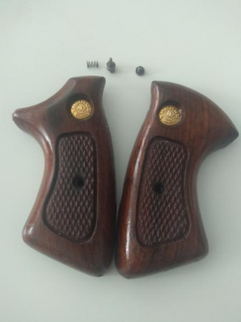  15954061078992055906109.jpg Buenos dias tengo unas cachas de madera para revolver Taurus en muy buen 00