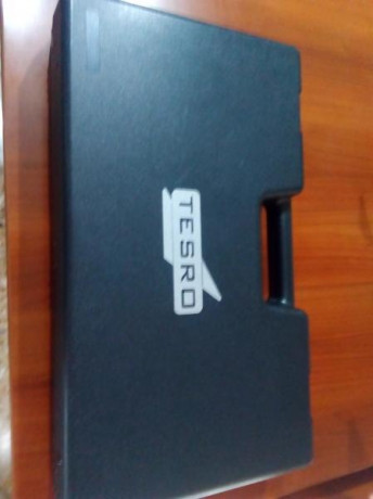 Se vende pistola marca TESRO TS 22 - 2 calibre 22 cacha talla M nueva con dos cargadores maletin original 01