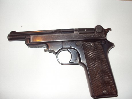  DSC02882.JPG   Hola quien me puede ayudar con una pistola star calibre 32 creo que es del año 1914  la 22