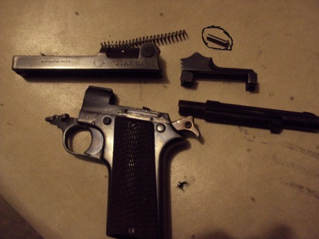  DSC02882.JPG   Hola quien me puede ayudar con una pistola star calibre 32 creo que es del año 1914  la 21