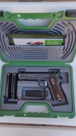 Vendo esta pistola modelo 1911 Remington R1 está en un estado excelente sin marcas ni arañazos equipada 00