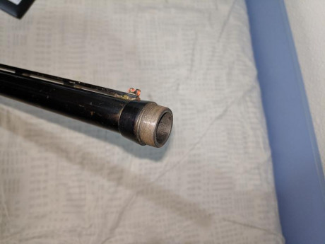 Buenos días

He adquirido una escopeta Remington 1100 de segunda mano, la cual tiene realizada una rosca 01