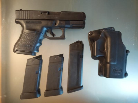 Vendo mi Glock 30 del calibre .45, utilizada como arma de defensa con no más de 100 disparos en galería. 01