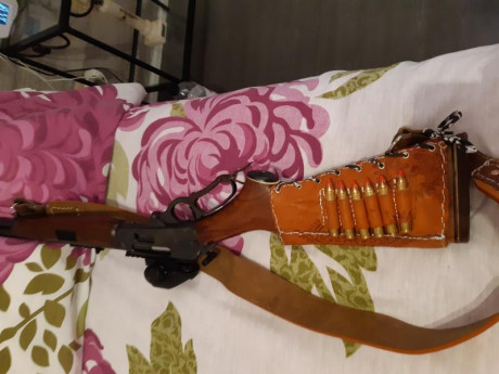 Hola cambiaria un marlin 444 muy bien de maderas y pavon con seguro lateral y visor punto rojo Vector 02