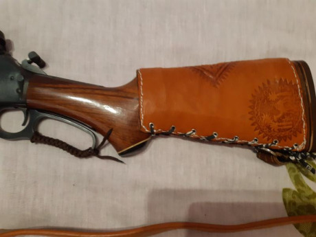 Hola cambiaria un marlin 444 muy bien de maderas y pavon con seguro lateral y visor punto rojo Vector 01