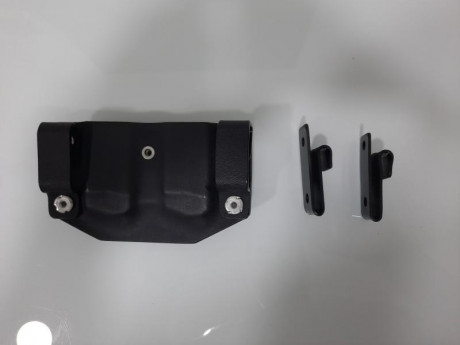 Buenas
Se vende portacargador doble de kydex, color negro, para cargadores de pistola glock doble hilera 00