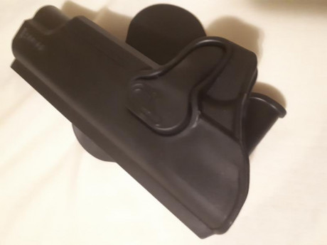 Se vende funda 1911 de pala extracción rápida whatsapp  precio de venta 10 € nueva 00