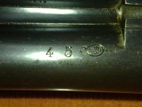 Hola a todos, acabo de conseguir una escopeta marca Jabali,de perrillos ccon bascula cuadrada en muy buen 71