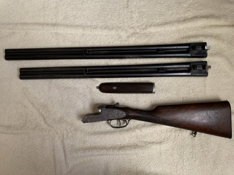 Se vende escopeta paralela muy bonita del Calibre 12 Sucesores de Joaquin fernandez con doble juego de 01