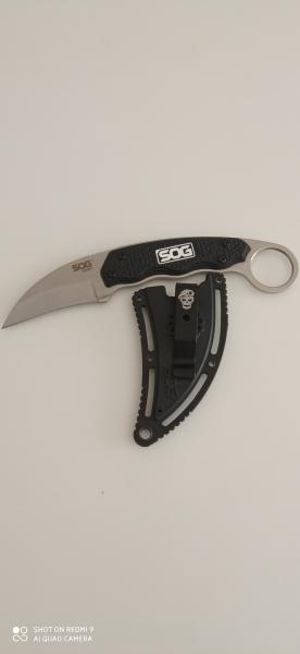 Se pone en venta un cuchillo de la marca SOG modelo GAMBIT sin ningún uso y con funda de kydex original. 00