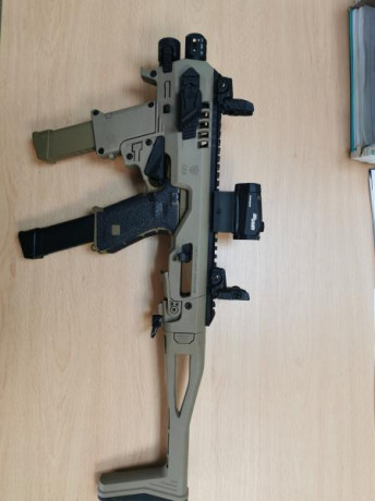 Se vende Micro Roni con los siguientes accesorios:

Visor de punto Rojo SIG Sauer
Miras abatibles Magpul 01