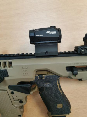 Se vende Micro Roni con los siguientes accesorios:

Visor de punto Rojo SIG Sauer
Miras abatibles Magpul 10