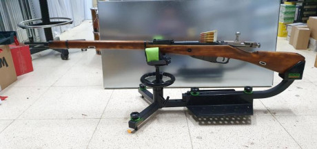 El Mosin-Nagant ..
es un rifle militar accionado por cerrojo, con cargador de cinco proyectiles, que 31