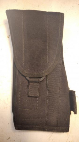 Funda  para pistola táctica ajustable para armas con linterna táctica y/o láser.
Ambidiestra.
Fabricado 00