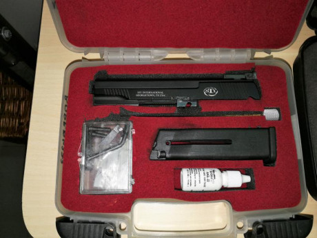 Buenos dias.

Vendo esta pistola, se trata de una STI Edge en calibre 9mm. i un kit del .22.
Habrá tirado 00