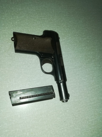 Buenas vendo mi  astra 300 9 corto esta guiada en F esta bien cuidada tiene un solo cargador viene con 00