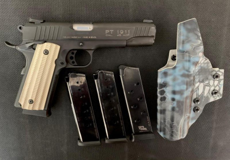 Vendo Taurus 1911 del 45ACP, como nueva, muy poco uso, guiada en F, en su caja original con sus llaves 00