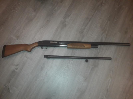 Vendo escopeta de corredera marca maverick con dos cañones uno liso de 60cm  y el otro de 70cm con choques 01