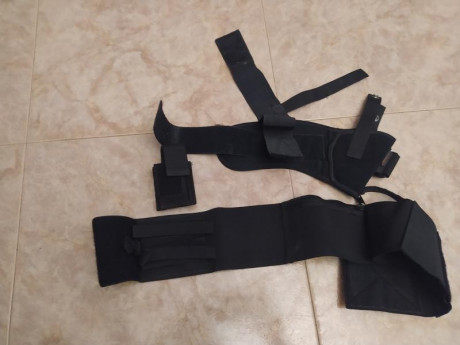 Vendo faja elastica/ funda, con portacargador doble y bolsillo con cremallera, para cualquier modelo de 00