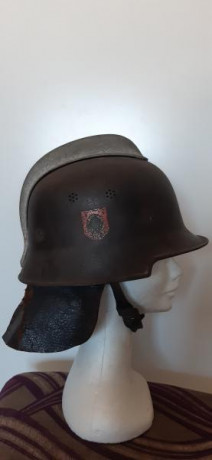 Casco modelo de 1934 perteneciente al cuerpo Feuerschutzpolizei (Cuerpo de Policía de Protección contra 00