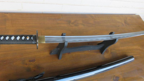 Lo dicho vendo mi KATANA de acero al carbono muy afilada fabricada en Toledo sin uso completamente nueva 22