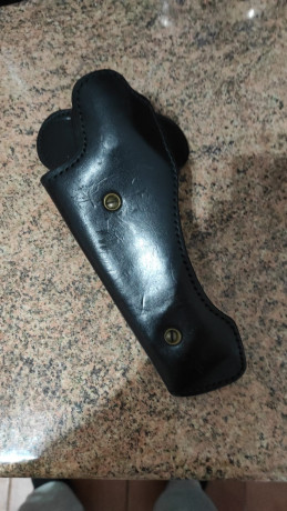Funda PRICE WESTERN LEATHER fabricada en Inglaterra en los años 90. 

Esto es para un revólver Smith and 02