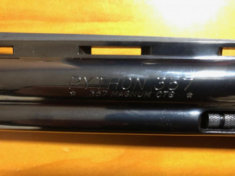 Muy a mi pesar y por motivos personales vendo revolver Colt Phyton cal.357 mag - 38  con cañón de 6 Pulgadas. 00