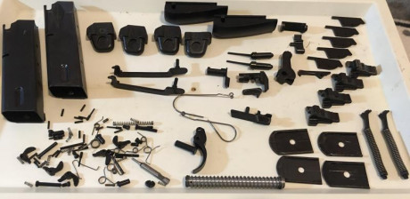 Tengo piecerio vario que ya no voy a dar uso de una llama M82 pasadores,muelles,rampones, agujas, martillo,uña 01