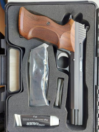 Un compañero del club vende esta Sig Sauer P210 con cañon de 6”. Funciona perfectamente y agrupa que da 01