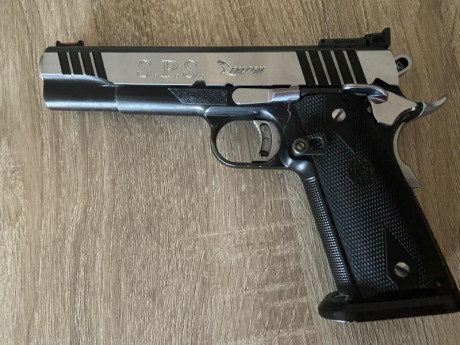 Hola a todos 
En venta sps Falcón 9mm 1911 con 6 cargadores funda cinturón y porta cargadores por si se 02