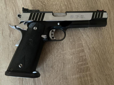 Hola a todos 
En venta sps Falcón 9mm 1911 con 6 cargadores funda cinturón y porta cargadores por si se 01