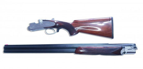 Se vende escopeta Beretta S2 con cañón de 71cm, choques fijos, de 1 y 3 estrellas, con culata de lomo 01