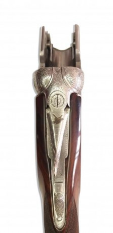Se vende escopeta Beretta S2 con cañón de 71cm, choques fijos, de 1 y 3 estrellas, con culata de lomo 12