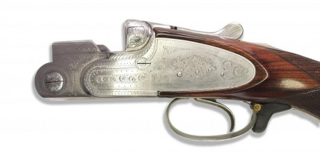 Se vende escopeta Beretta S2 con cañón de 71cm, choques fijos, de 1 y 3 estrellas, con culata de lomo 10