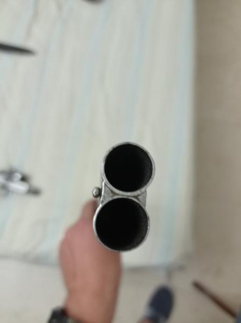 Buenas, tengo una paralela de perrillos del calibre 20 es una sarrasqueta no tengo ni idea de que año 31