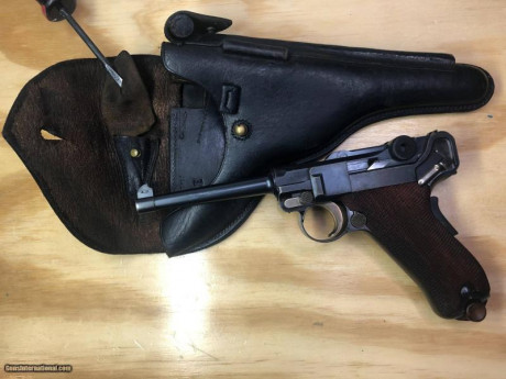 Por favor, busco Luger DWM 1906 Portuguesa, 7,65 mm, cañón militar de 4/34 ", empuñadura de seguridad, 02