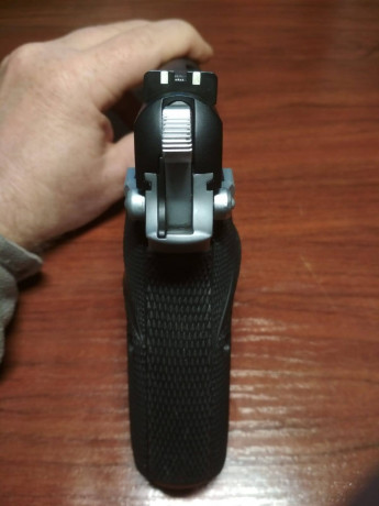 Hola.  Vendo esta pistola de 9mmP. de 13 disparos mas uno. dos cargadores, su maletín original. Prácticamente 02