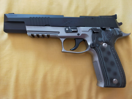 Hola.
Vendo en perfecto estado. Guiada en F, Sig Sauer XFIVE 9mm con conversor Sig Sauer XSIX del 22 de 00