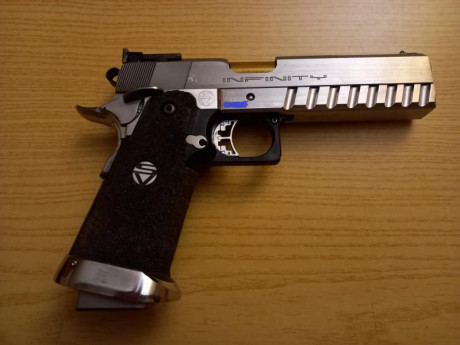 Un amigo me ha pedido que le anuncie esta pistola. tiene poco uso. es una infinity en calibre .40.
el 00
