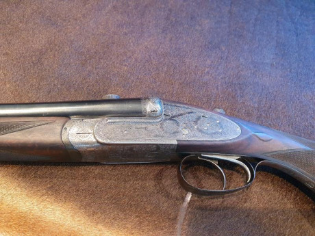rifle express paralelo Victor Sarrasqueta en el magnífico y peculiar calibre 303 british , preciosos y 02